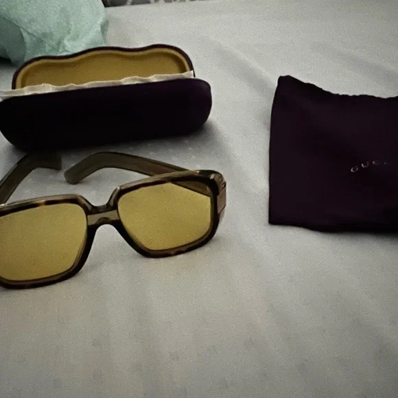 Sun glasses ? New Gucci . Authentic and beautiful display picture 2